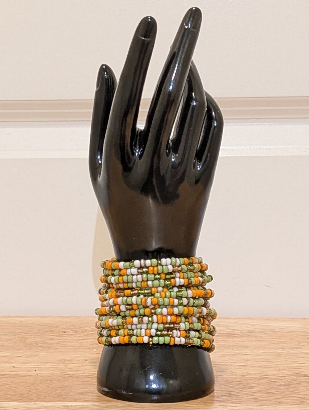 EUC 15 Strand Seed Beaded Green Orange and White Stretch Cuff Bracelet